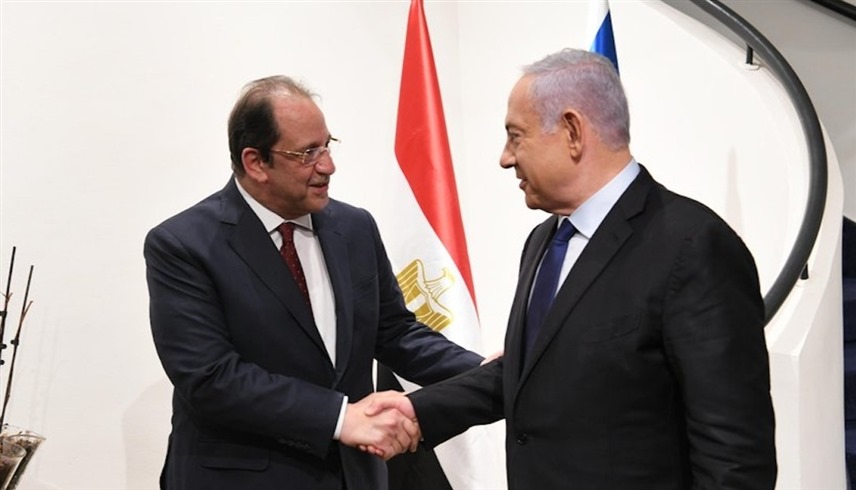 مدير المخابرات المصرية اللواء عباس كامل في لقاء سابق مع نتانياهو (رويترز)