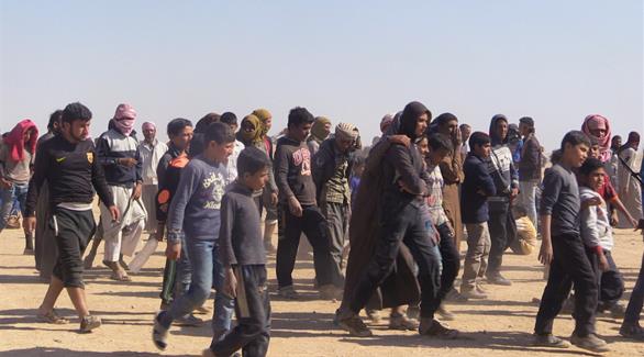 نازحون بالقرب من الحدود العراقية السورية (أرشيف)