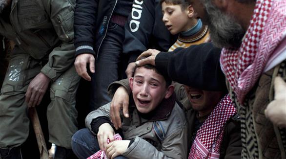 أطفال حلب يبكون على فقدان أهاليهم (أرشيف)