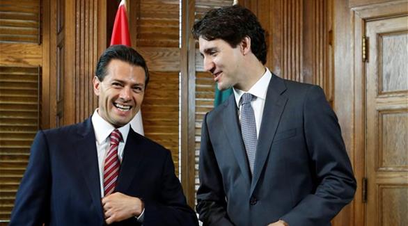 رئيس الحكومة الكندية جوستان ترودو ورئيس المكسيك انريكي بينا نييتو (أرشيف)