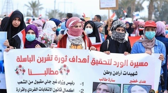 مشاركات في التظاهرة النسائية  بالنجف (تويتر)