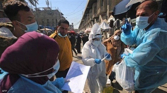 فريق صحي عراقي في حملة فحص ميدانية (أرشيف)